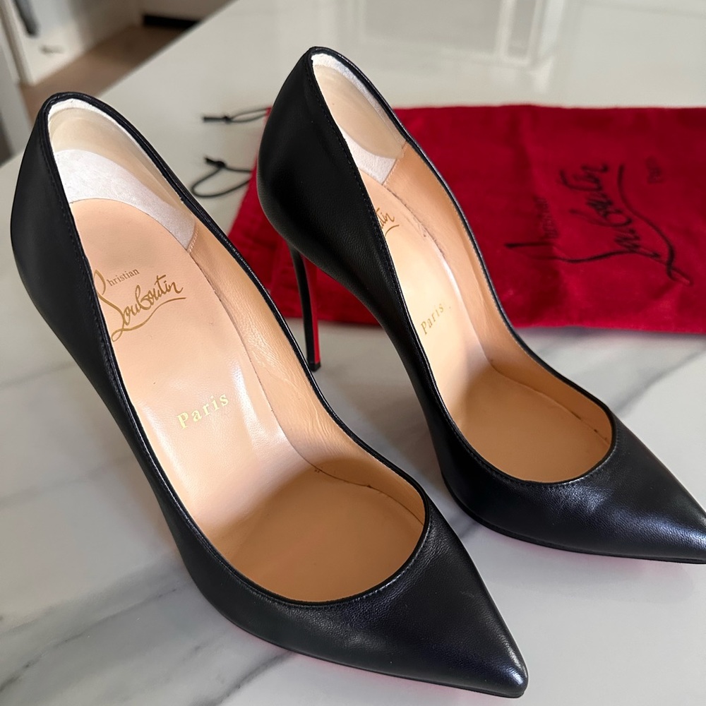 Authentic Christian Louboutin Kate 85mm heels in size 37. Black Napa Leather.